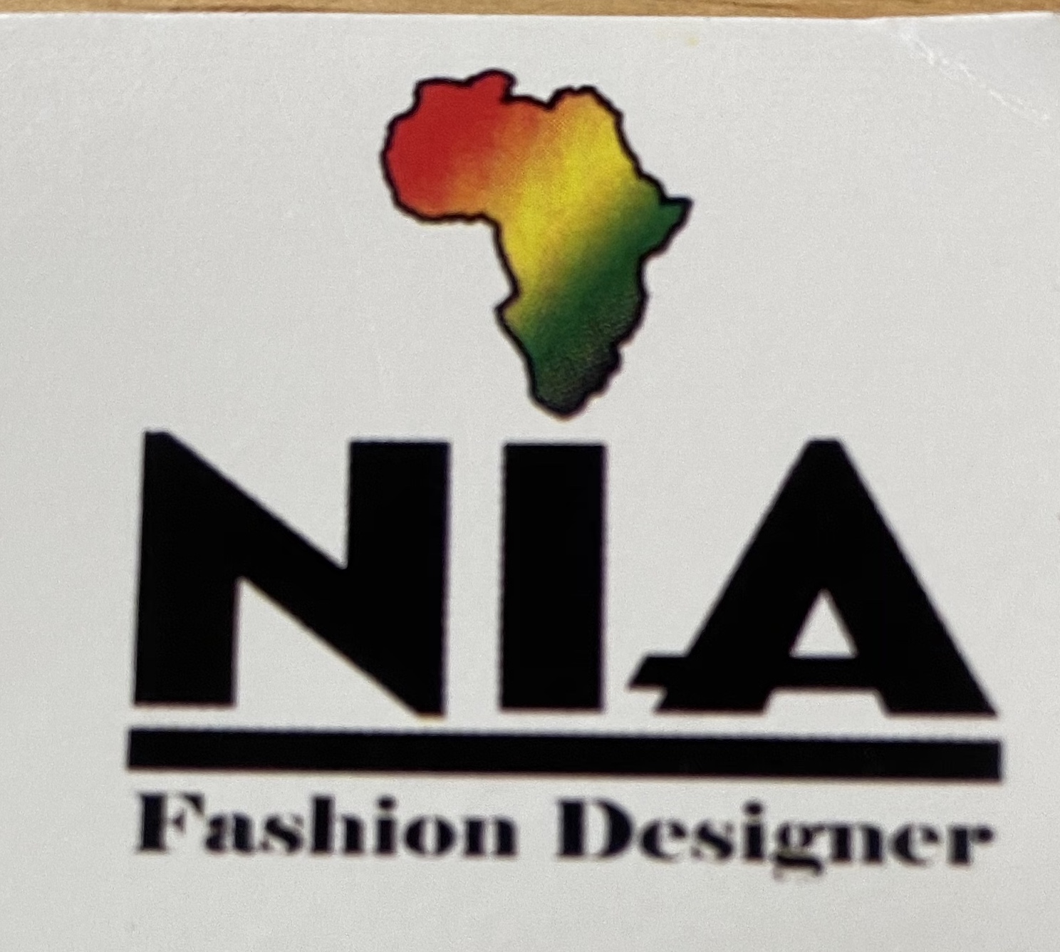 Nia Fashion Designer logo